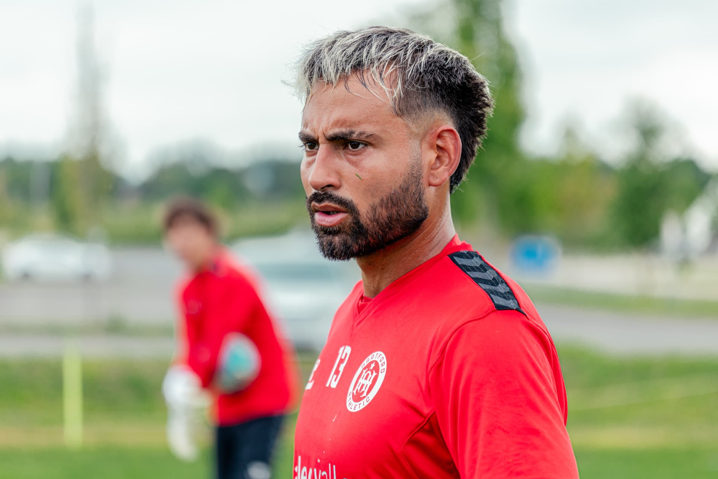 Lucas Espada in Hartford Athletic training kit on the training ground